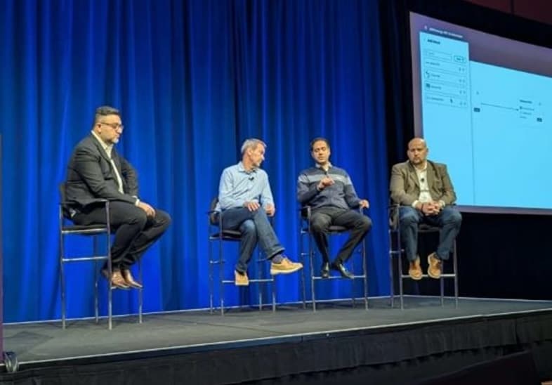 A person working on a laptop in a modern office